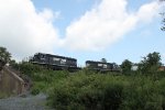 NS 3374 and NS 3347 bring train H53 off Rockville bridge toward Enola yard